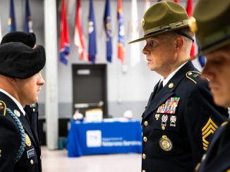 Uniformed soldiers in a military ceremony displaying pride and discipline in Knoxville, Tennessee.